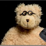 MSD Natural Rubber Mousepad Mouse Pads/Mat design: 4515907 Teddy bear in glasses close up portrait on black background