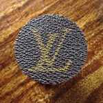 Universal cell phone holder fashioned with authentic repurposed Louis Vuitton canvas