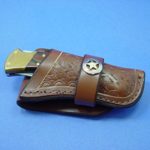 Western-style Buck 110 Folding Pocket Knife Sheath. The Sheath Is Dyed Light Brown. The Sheath Will Take up to a 2 Inch Belt. It Comes with a Ranges Star Concho. This Is for Sheath Only Knife Not Included.