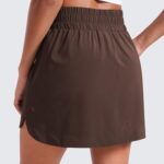 CRZ YOGA High Waisted Golf Skirts for Women A Line Tennis Athletic Casual Skort with Inner Shorts Pockets Hot Fudge Brown Small